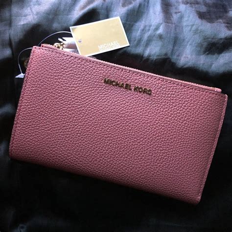 michael kors rose colored wristlet|Michael Kors outlet online wallets.